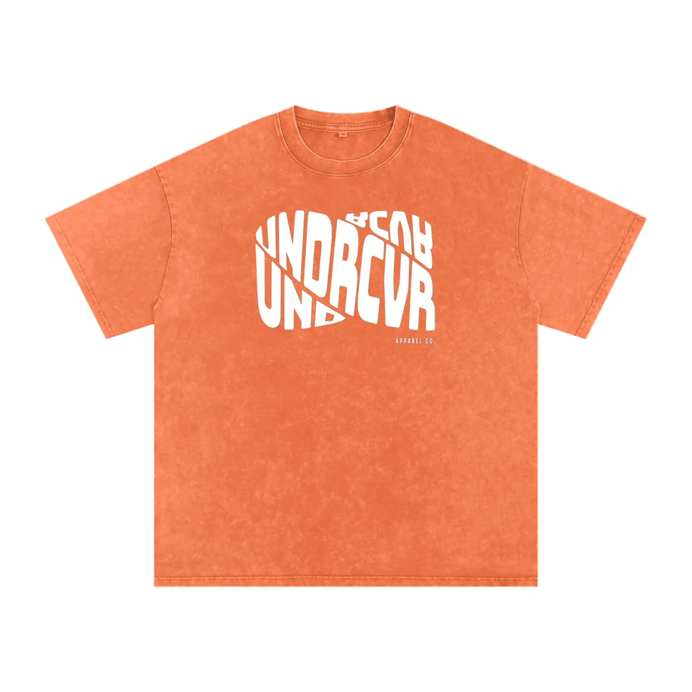 An orange mineral-wash t-shirt with a white graphic print on the front reading 'UNDRCVR' and 'BEYOND UNDRCVR' in a stylized overlapping layout.
